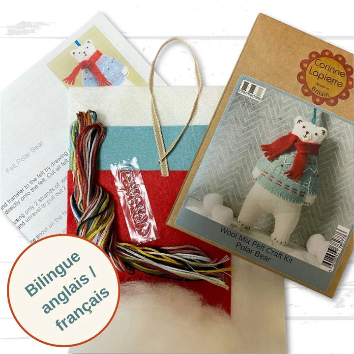 Felt polar bear craft kit with instructions and materials.