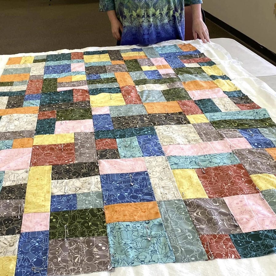 Pre-beginner student's colorful patchwork quilt endpaper